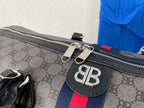 Graffiti coated Century joint travel bag
