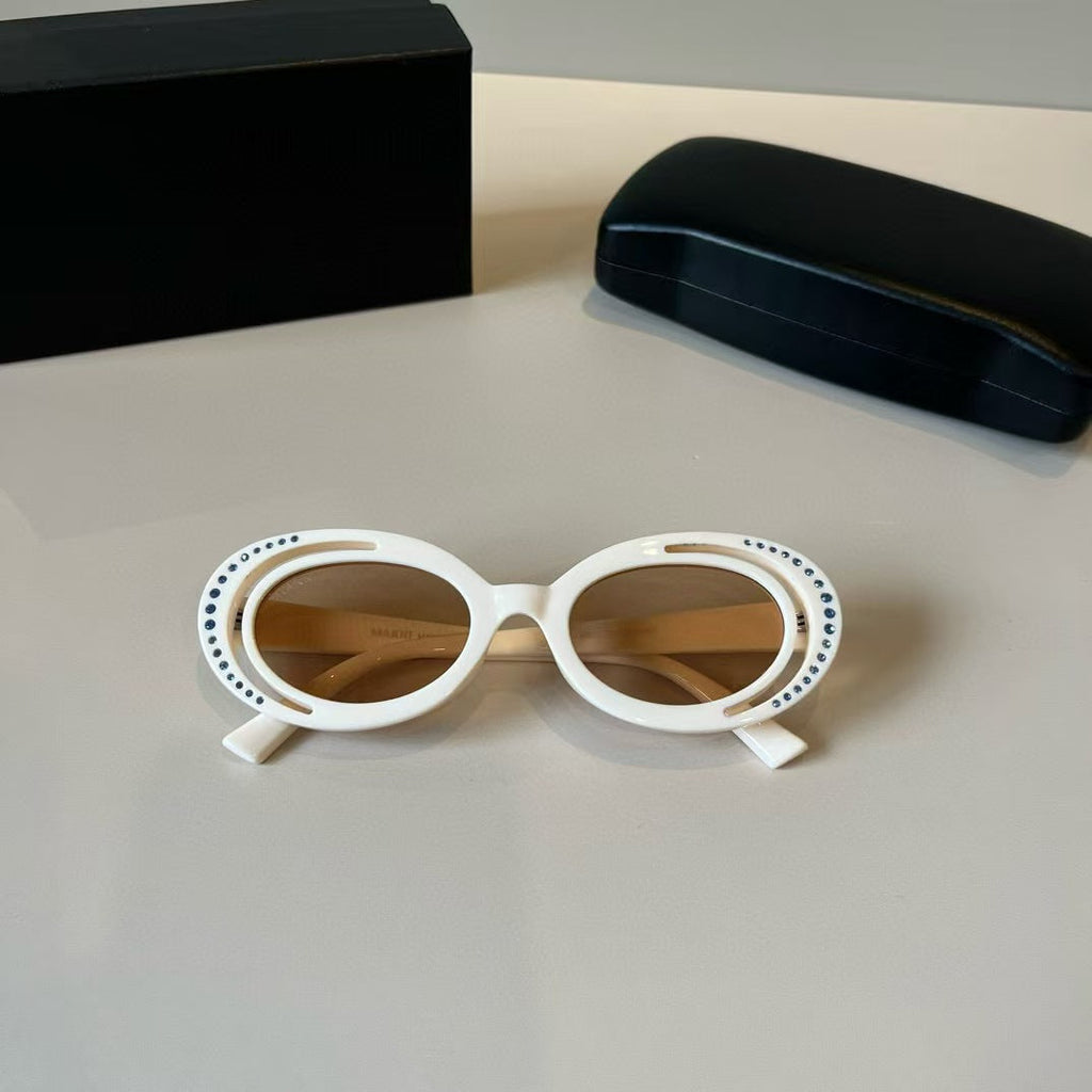 Explosive elliptical sunglasses