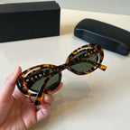 Explosive elliptical sunglasses
