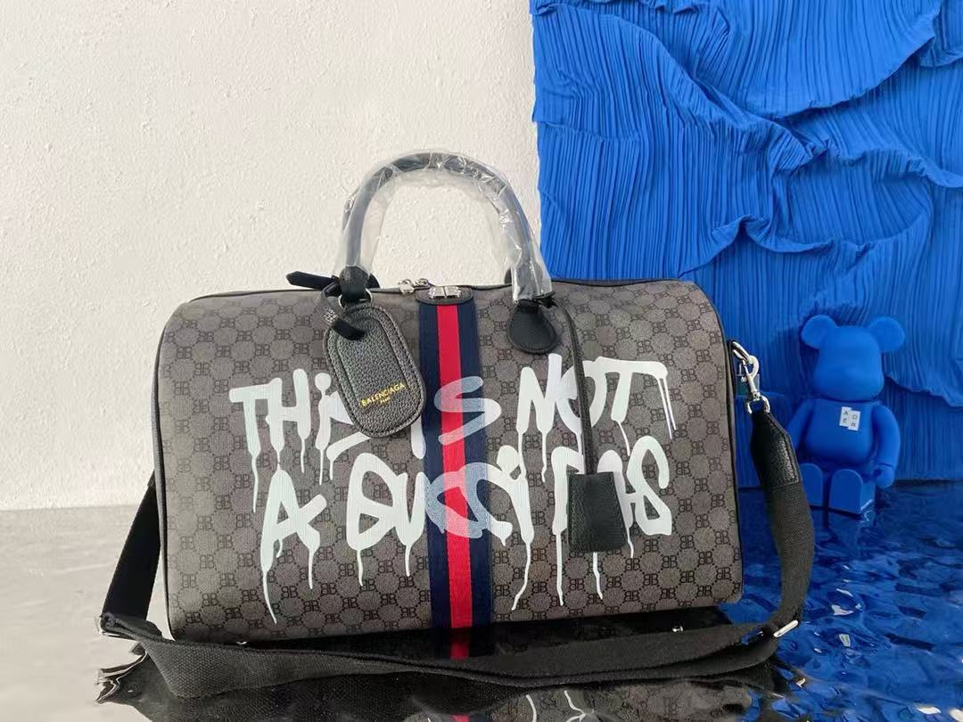 Graffiti coated Century joint travel bag