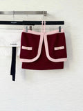 Pure wool, custom-colored and dyed, contrast-colored stitching, and camisole