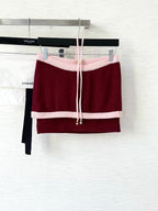 Pure wool, custom-colored and dyed, contrast-colored stitching, and camisole
