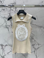 Open-knit vest with a Peter Pan collar