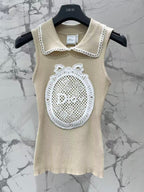 Open-knit vest with a Peter Pan collar