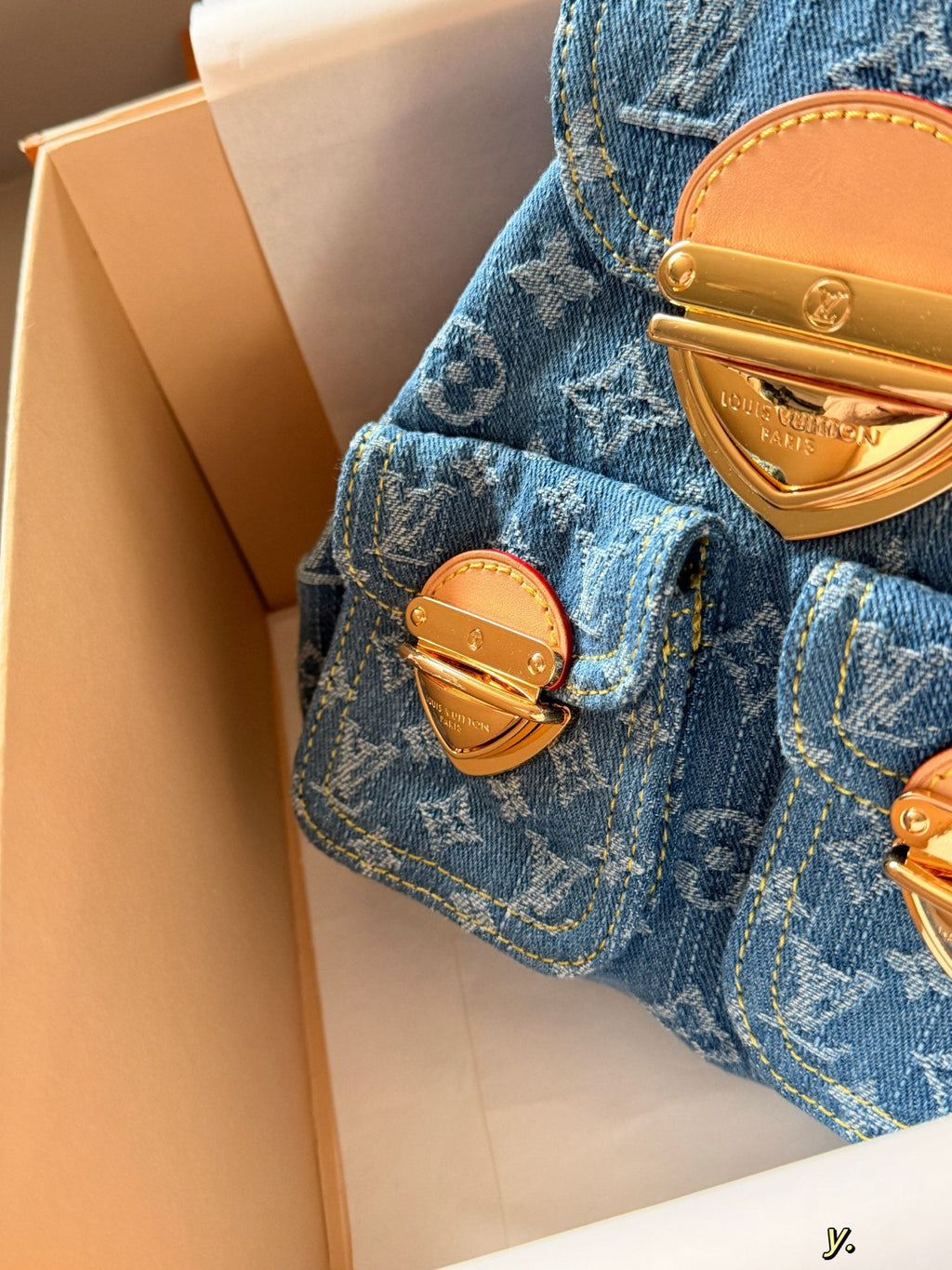 Blue denim double pocket triangular buckle backpack