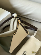 Woven handle, color blocked geometric bag, cowhide