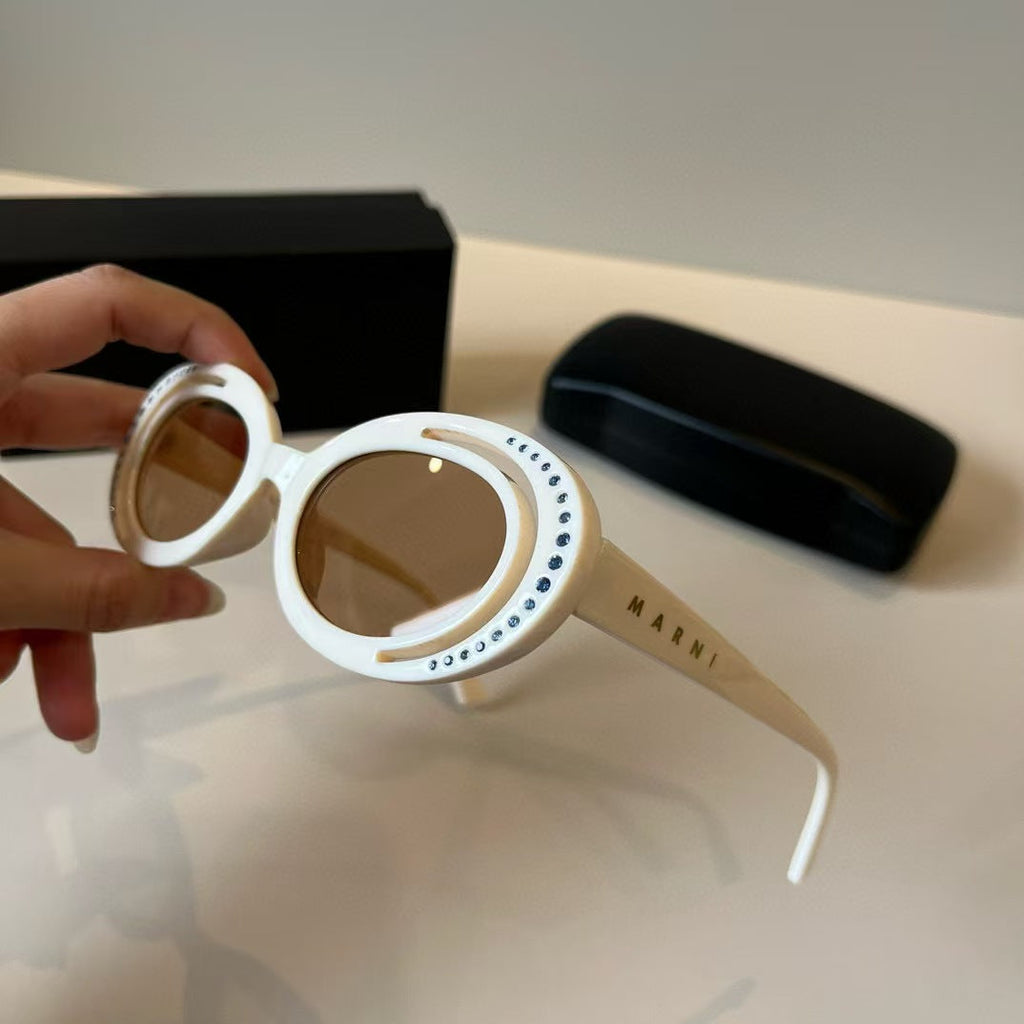 Explosive elliptical sunglasses