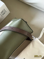 Woven handle, color blocked geometric bag, cowhide