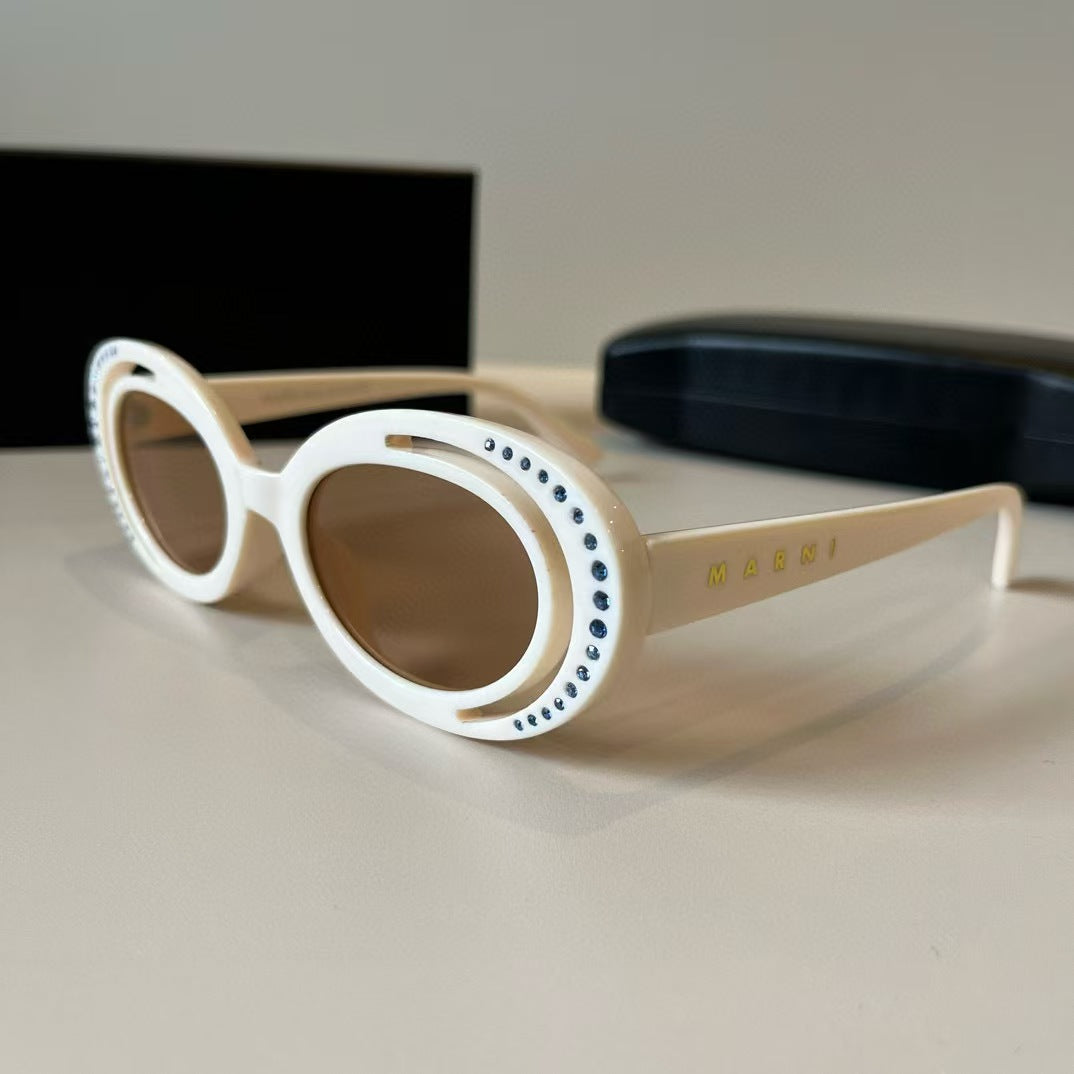 Explosive elliptical sunglasses