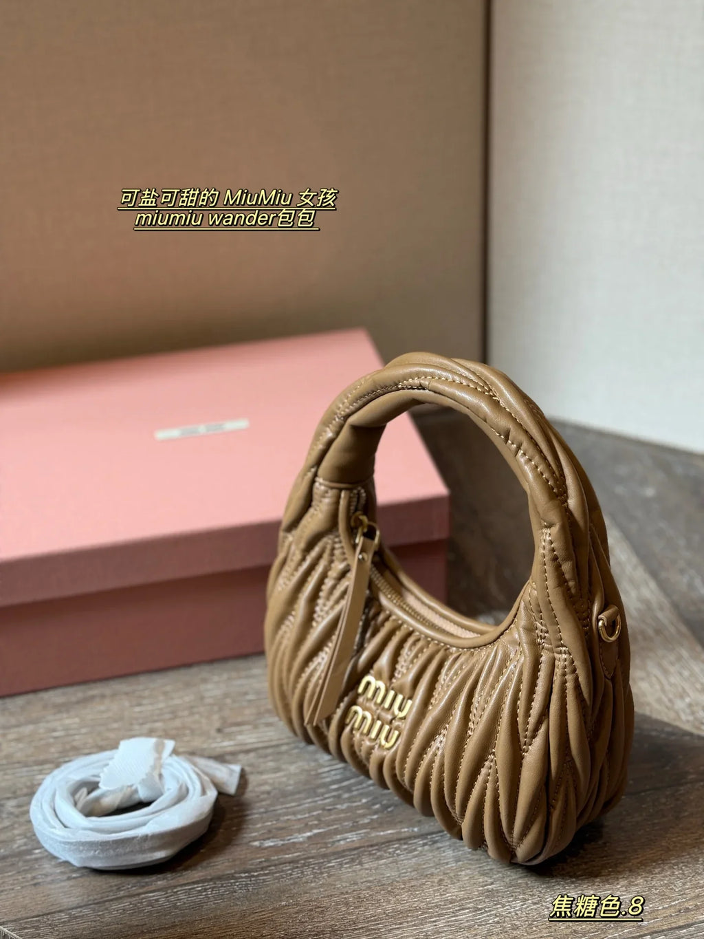 Wrist bag with wrinkled crescent shape