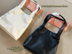 Vertical trapezoidal tote bag