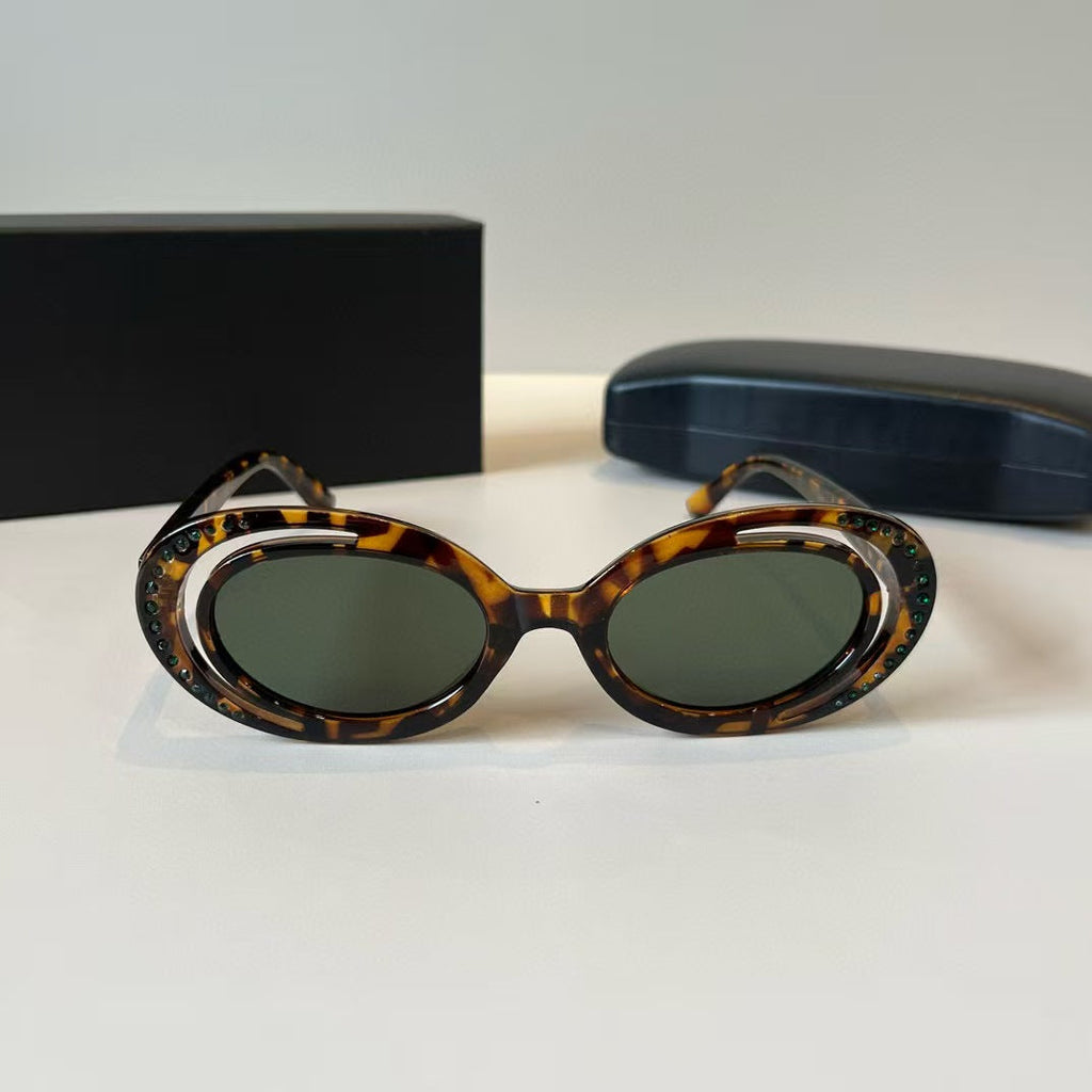 Explosive elliptical sunglasses