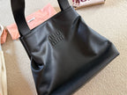 Vertical trapezoidal tote bag