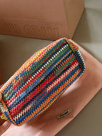 Rainbow colored woven lunch box bag