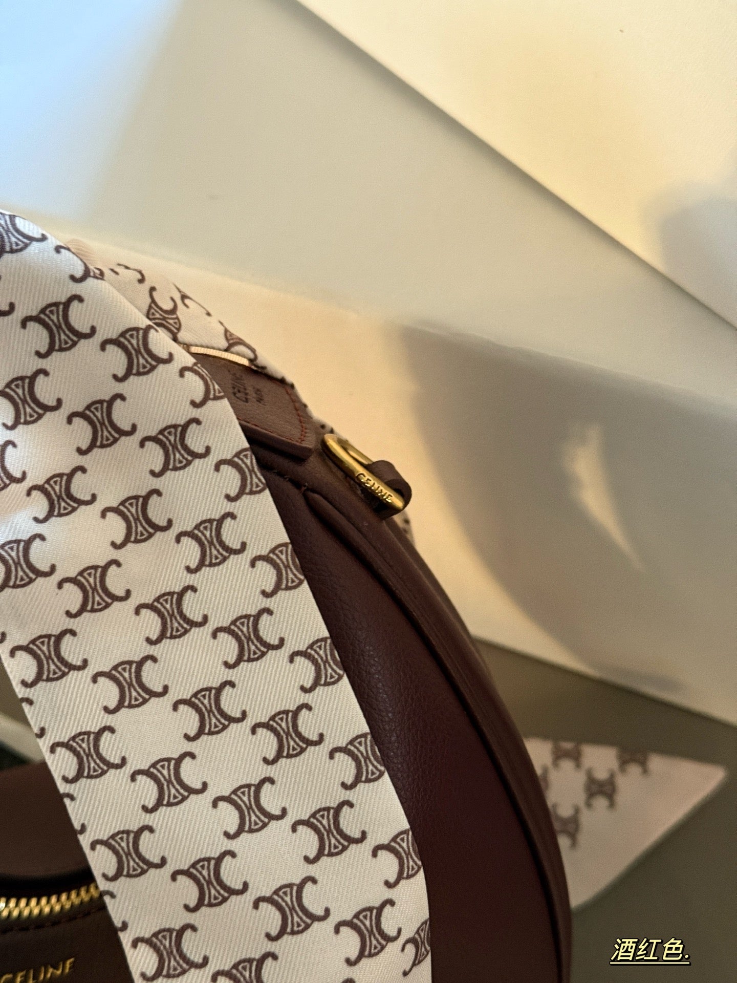 Crescent belt buckle armpit bag