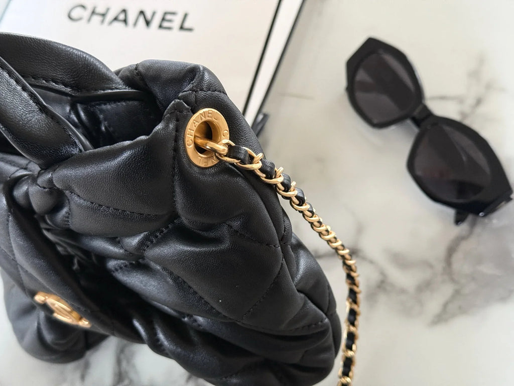 Bow handle chain sheepskin bag