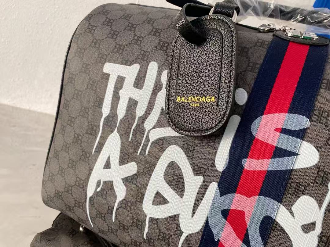 Graffiti coated Century joint travel bag