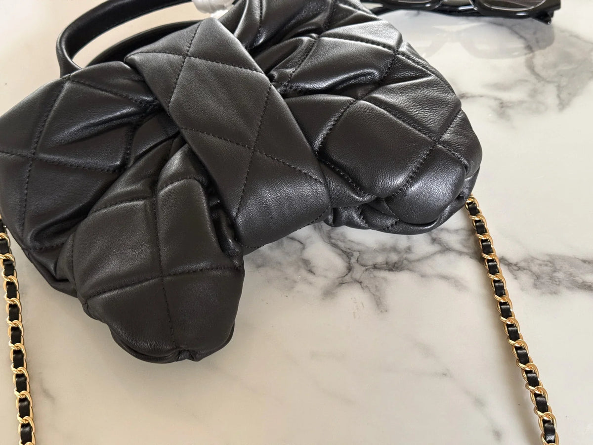 Bow handle chain sheepskin bag