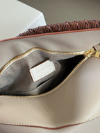 Woven handle, color blocked geometric bag, cowhide
