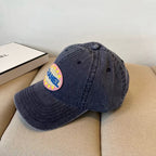 Explosive letter embroidered baseball cap