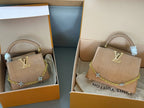 Wrist bag with wrinkled crescent shape