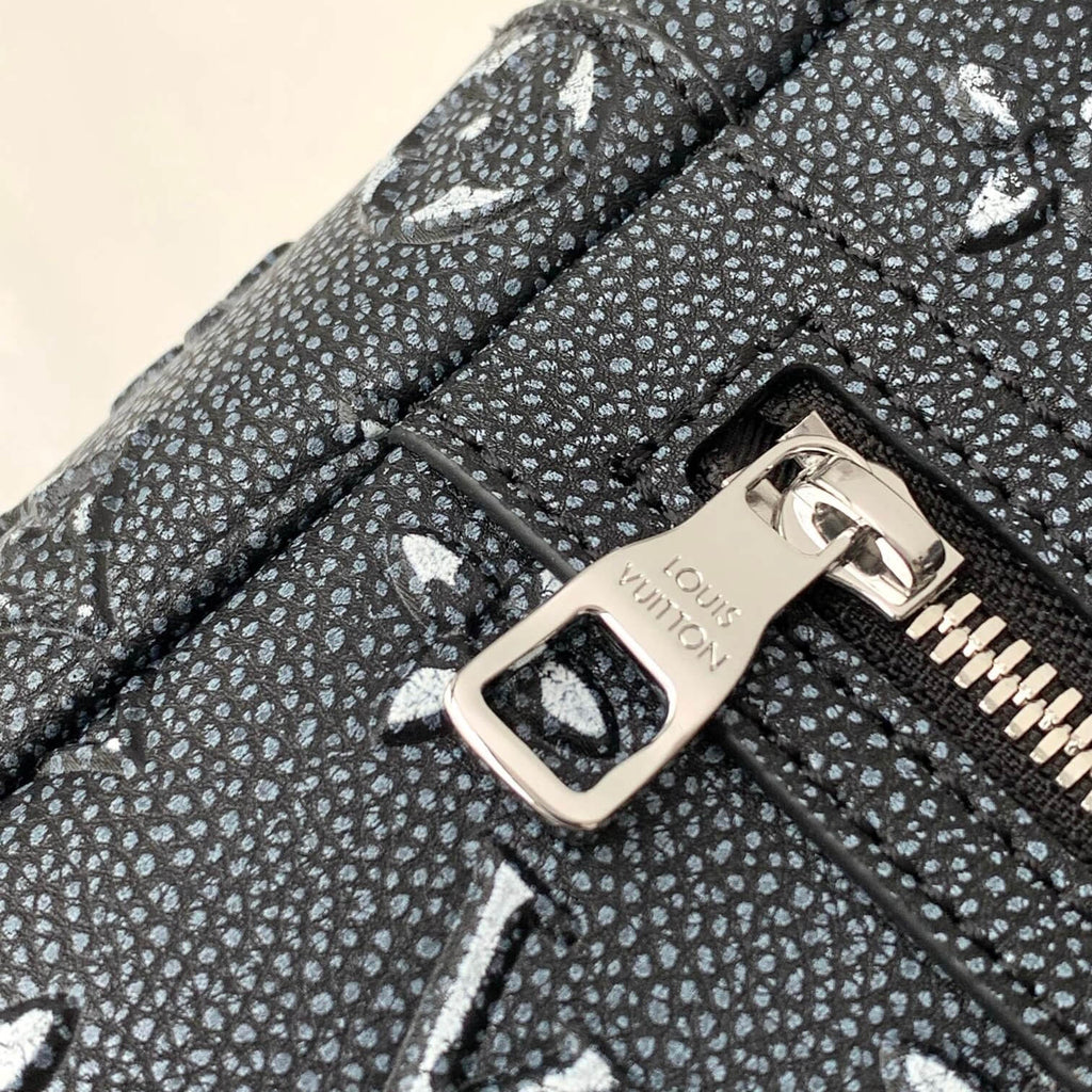 Vintage Embossed Leather Backpack