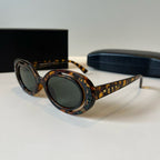 Explosive elliptical sunglasses
