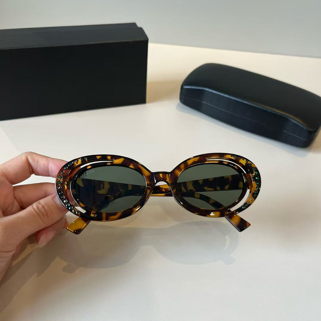 Explosive elliptical sunglasses