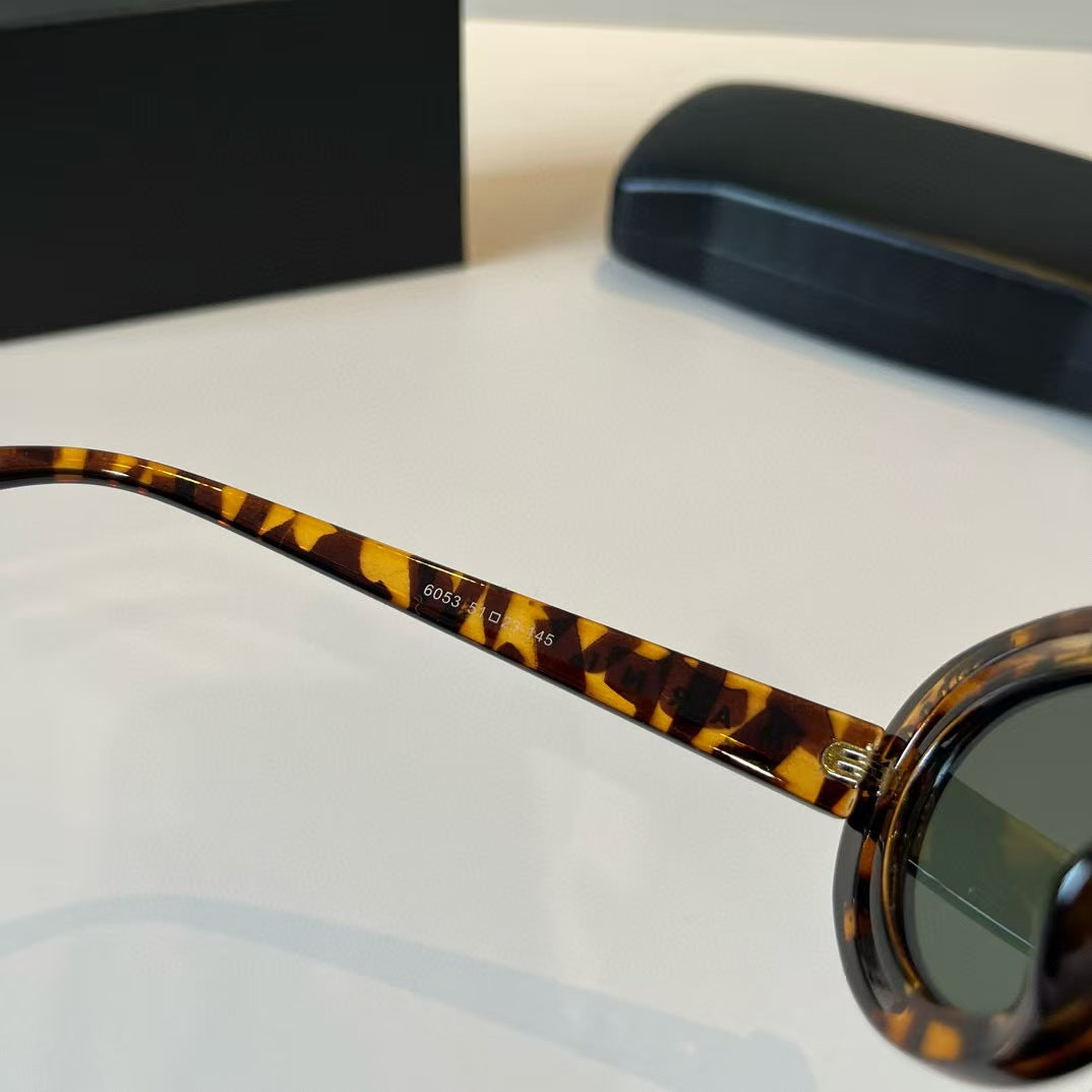 Explosive elliptical sunglasses