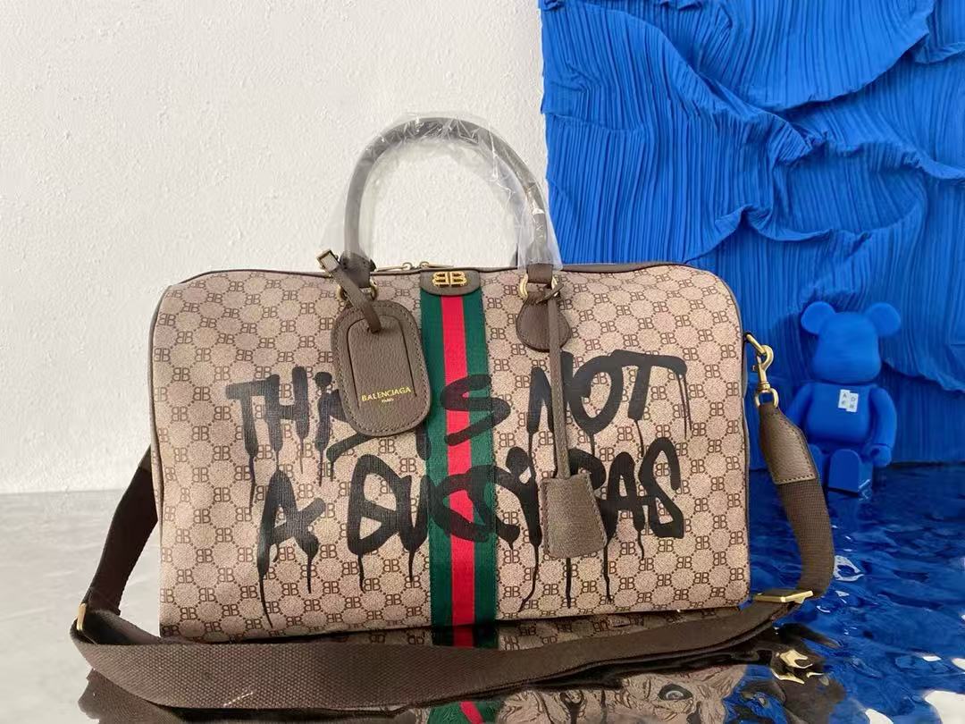 Graffiti coated Century joint travel bag