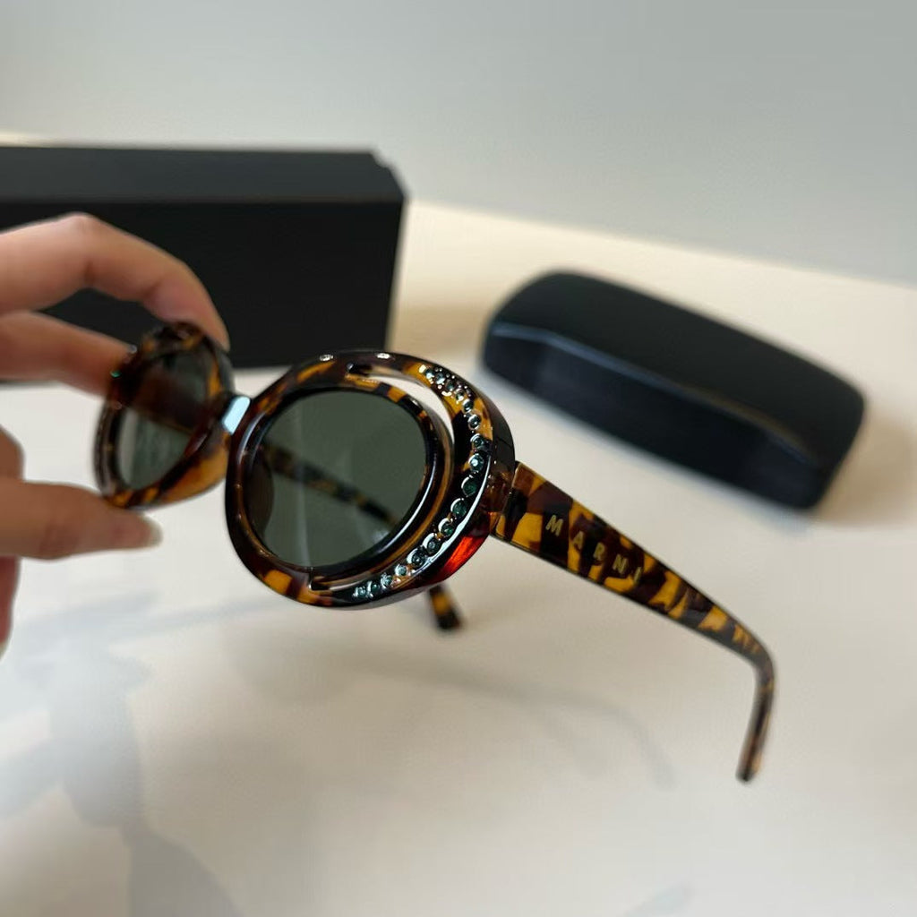 Explosive elliptical sunglasses