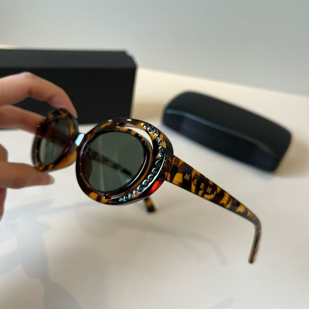 Explosive elliptical sunglasses
