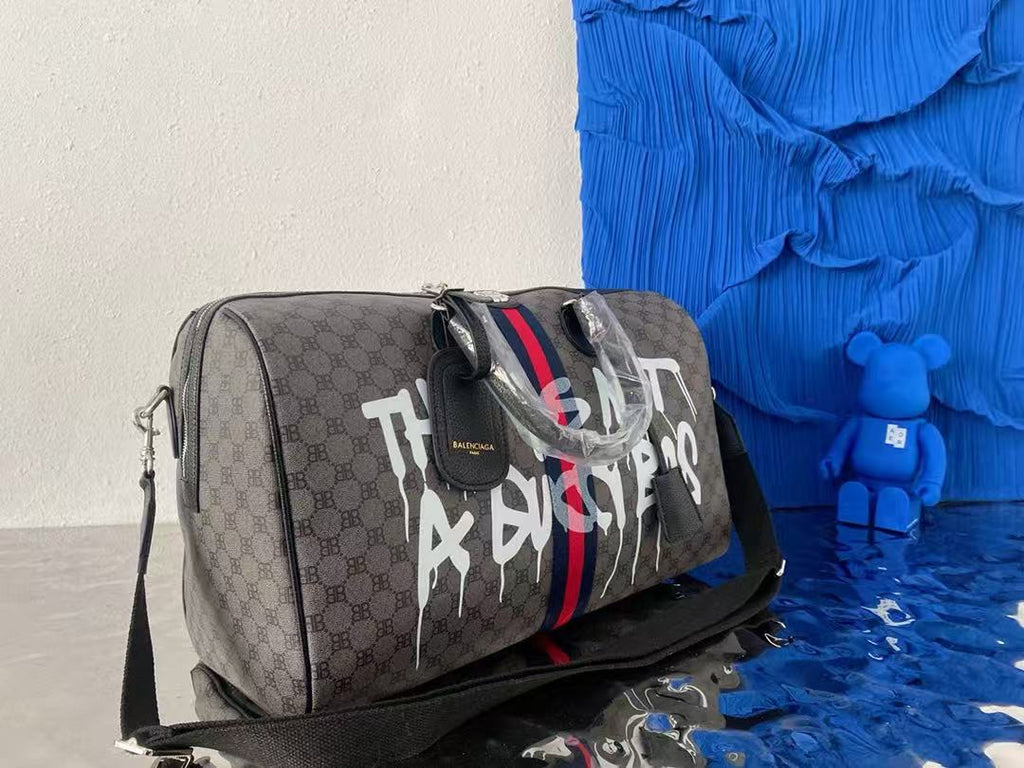 Graffiti coated Century joint travel bag
