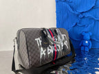 Graffiti coated Century joint travel bag