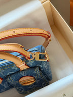 Blue denim pocket pillow bag