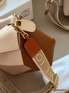 Color blocked geometric bag with leather shoulder straps