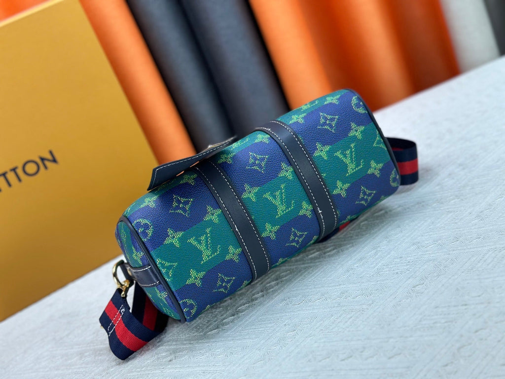 Blue green color blocked travel bag