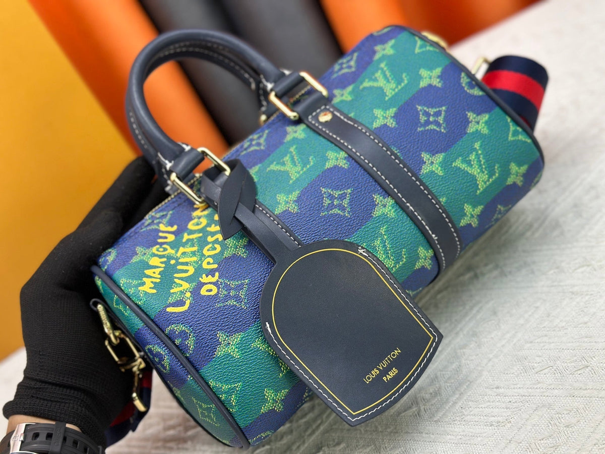Blue green color blocked travel bag