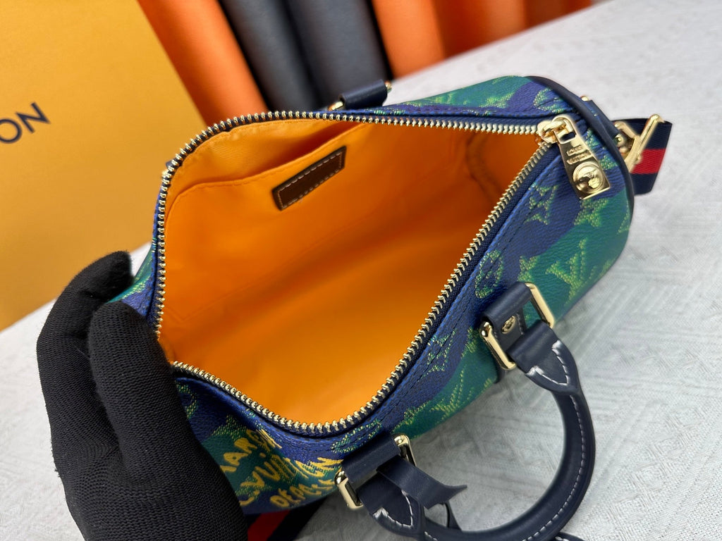 Blue green color blocked travel bag